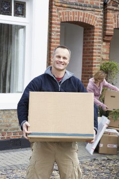 Packing boxes and furniture prepared for a Belgravia flat move
