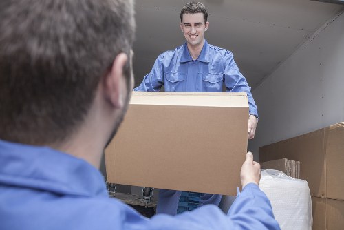 Removals team handling fragile items during a Belgravia apartment relocation
