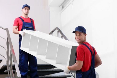 Man and van removals service in Belgravia with a moving van outside elegant central London properties