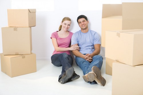 Professional movers handling furniture and valuables during Belgravia home moves