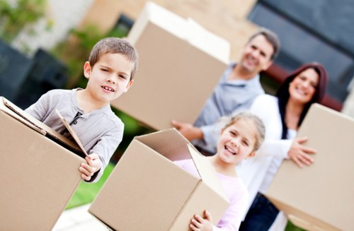 Careful loading of business furniture for a move in central London
