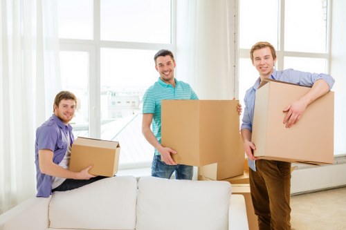 Trained movers handling items carefully during relocation