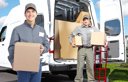 Expert Belgravia removals team handling furniture in a luxury property